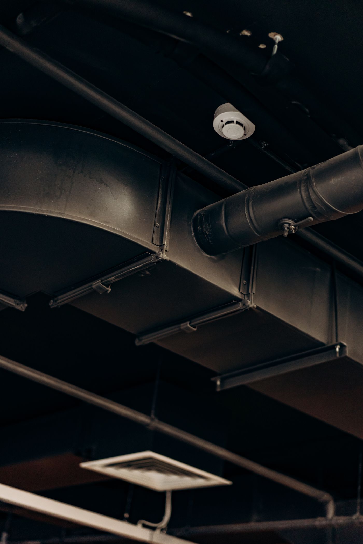 Technician cleaning residential air ducts — results from air duct cleaning SEO by Websza