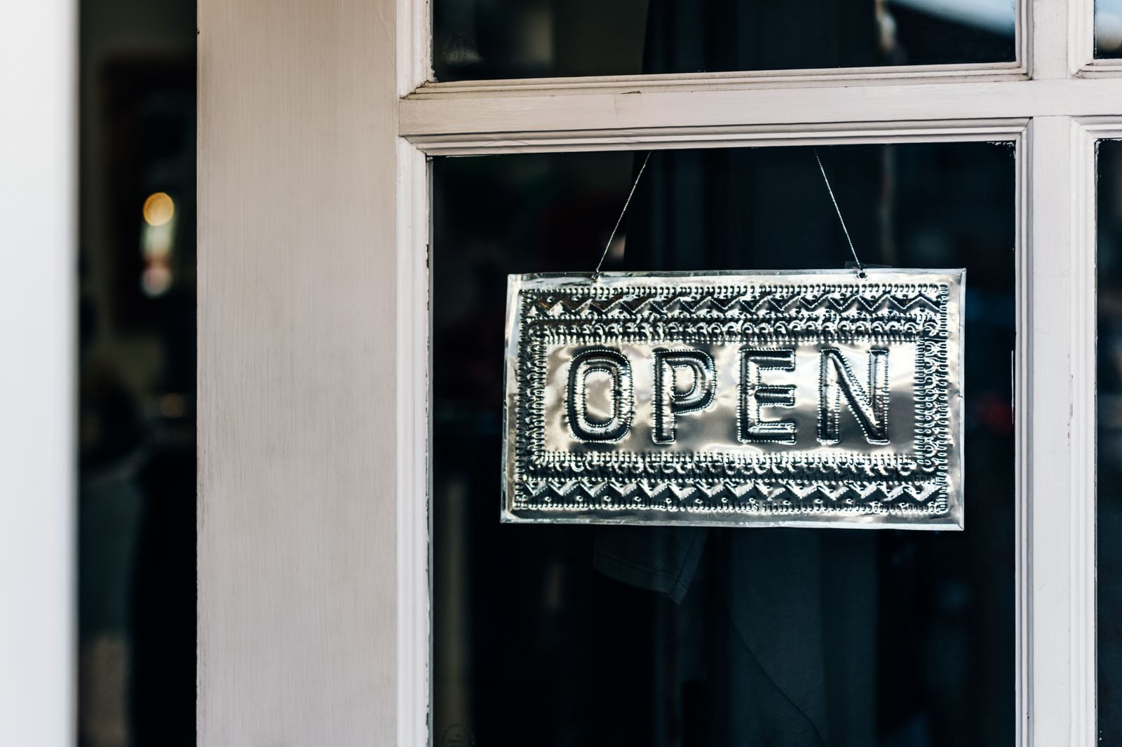 Small business storefront with open sign - Google Business Profile optimization by Websza