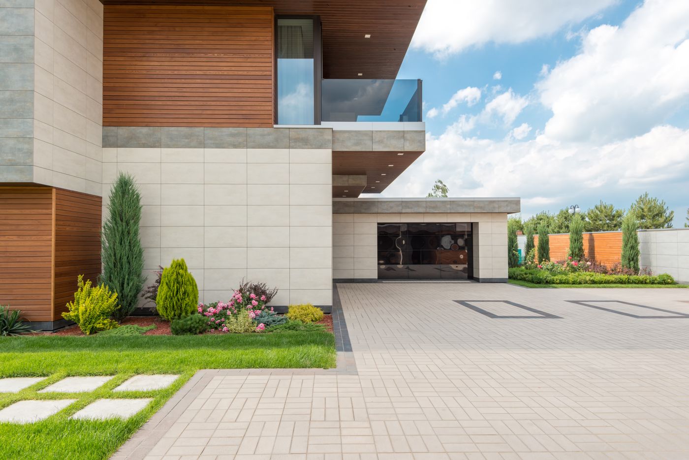 Modern home exterior with attached garage — SEO results for garage door companies