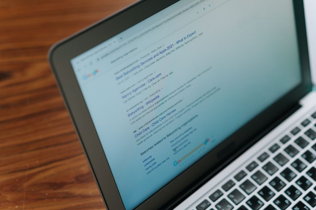 Laptop displaying a search engine page used in a Google Business Profile optimization service review